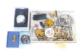 An assortment of costume jewellery and a watch.