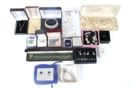 Fifteen boxes of costume and other jewellery. Including pendants, earrings, necklaces etc.