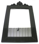 A contemporary bevelled edge wall mirror.