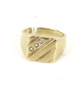 A modern 9ct gold and cubic zirconia three-stone square signet ring.