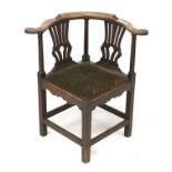 A Victorian mahogany corner chair.