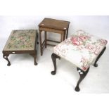 Two 19th century and later footstools and a nest of two tables.