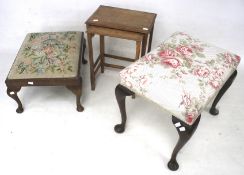 Two 19th century and later footstools and a nest of two tables.