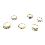 A group of six 9ct gold and gem set dress rings.