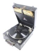 A vintage portable gramophone.