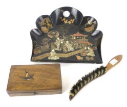 A vintage lacquer dustpan and brush and an oriental box.