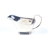 A vintage small silver sauce boat.