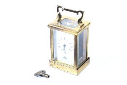 A 20th century Imperial brass carriage clock. The white dial with Roman numerals, H11.