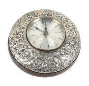 A silver mounted mahogany domed-round wall clock.