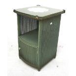 A Lloyd Loom 'Lusty' bedside cabinet. Coloured green with gilt details and a glass top, H64cm x W40.