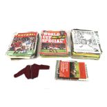 A collection of vintage football magazines.