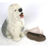 Beswick ceramic Dulux dog and a Poole shell. The dog in a seated pose, H29.