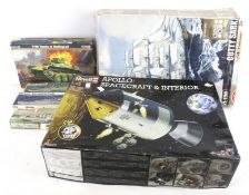 A collection of assorted vintage model kits.