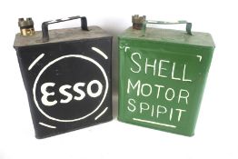 Two early/mid-20th century oblong petrol cans with brass caps.