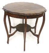 An Edwardian mahogany occasional table.