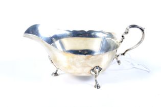 A vintage small silver sauce boat.