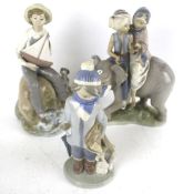 Three Lladro Daisa porcelain figures. Including an elephant. Max.