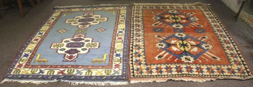 Two Persian style wool rugs.