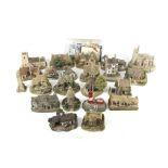 A collection of assorted Lilliput Lane model cottages. Max.