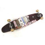 A vintage Longboard Saltrock skateboard.