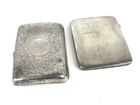 Two small rectangular cigarette cases.