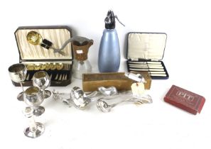 An assortment of silver plate and metalware.