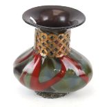 An Arts and Crafts style glass vase.