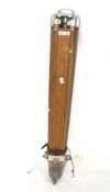 A vintage surveyor's wooden tripod. Kern Swiss 151-B, with metal points, 105cm closed.