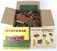 A collection of Minibrix bricks, roofs and base plates.