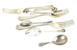 A collection of miscellaneous George III and later Old English pattern silver flatware.