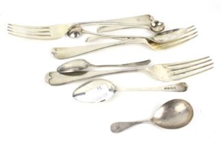 A collection of miscellaneous George III and later Old English pattern silver flatware.