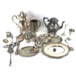 A collection of silverplated items.