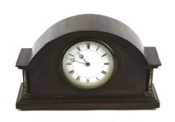 A Victorian mantel clock.
