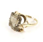 A vintage 9ct gold and smoky quartz single stone ring.
