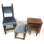 A 20th century chair, a footstool and a nest of three tables.
