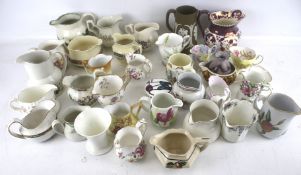 A collection of ceramic jugs. Including Royal Worcester, Poole, Wedgwood, Portmeirion, etc. Max.