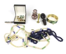 A small collection of costume jewellery and other items.