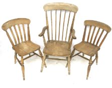 Three assorted pine kitchen chairs.