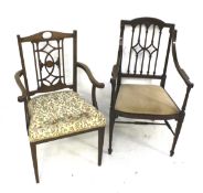 Two early 20th century carver arm chairs with inlay. Both with upholstered seats. Max.