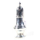 A vintage silver vase shaped sugar caster in George III style.