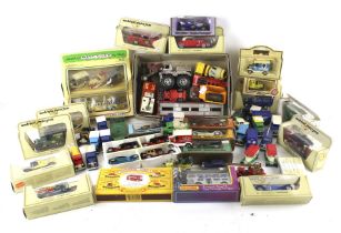 A collection of assorted die cast vehicles.