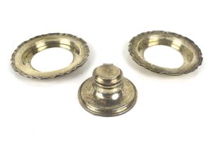 Two silver sweet-dish stands and a small capstan shaped ink well.