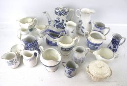 A collection of blue and white ceramic jugs. Including Spode, Royal Worcester, etc. Max.