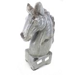 A large ceramic horse head ornament. Blue grey crackle glaze.