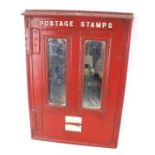 A vintage GPO 'Postage Stamps' cast metal vending front. Converted with two mirror sections.