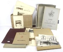 A collection of assorted vintage photographs and furniture magazines.