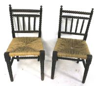 A pair of bobbin turned and rush seat chairs.