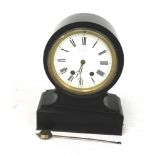 A 20th century mantel clock. The white enamel dial with Roman numerals, in a black slate case, H34.