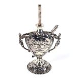 A late Victorian silver desk lighter in the form of a 'flaming heart'.
