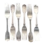 A set of six early Victorian silver fiddle pattern table forks.